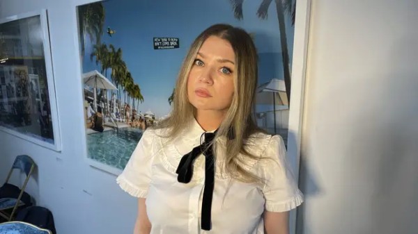 Anna Delvey, also known as Anna Sorokin, poses at her apartment in New York in May 2023 to promote her podcast The Anna Delvey Show