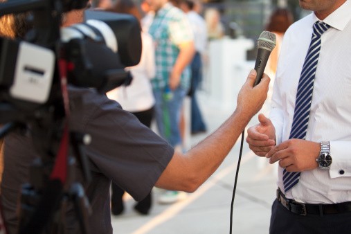 TV interview with businessman