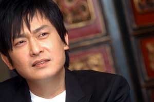 如果有机会爬到山顶,要他把妻小放在山下,爱家的王识贤说他办不到