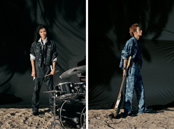 a man and a woman with a guitar and a drum set