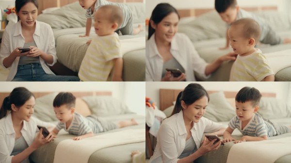 亚洲母子在家中互动互动:现代家庭生活方式