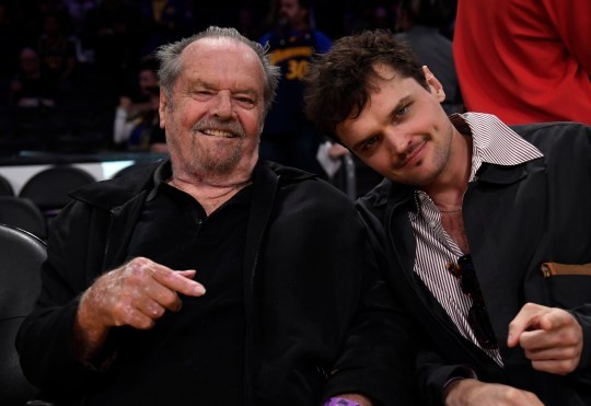 Jack and Ray Nicholson at a basketball game together