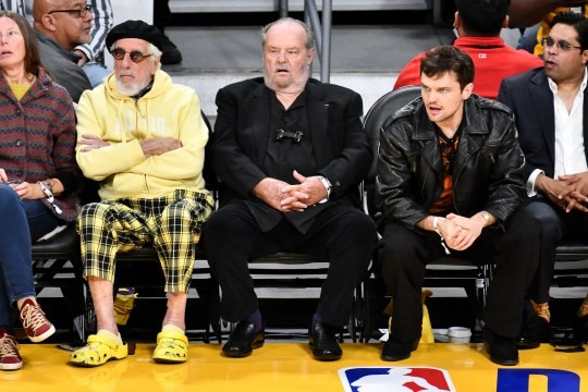 Jack Nicholson and Ray Nicholson at a basketball game together