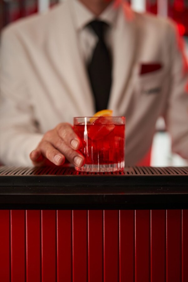 Camparino serves a Negroni in the Campari Lounge