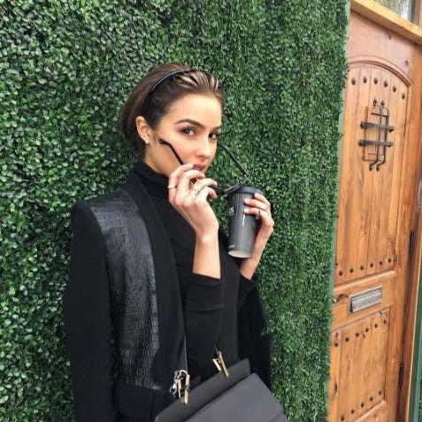 Door, Bag, Fashion accessory, Street fashion, Blazer, Shoulder bag, Home door, Wood stain, Door handle, Briefcase, 