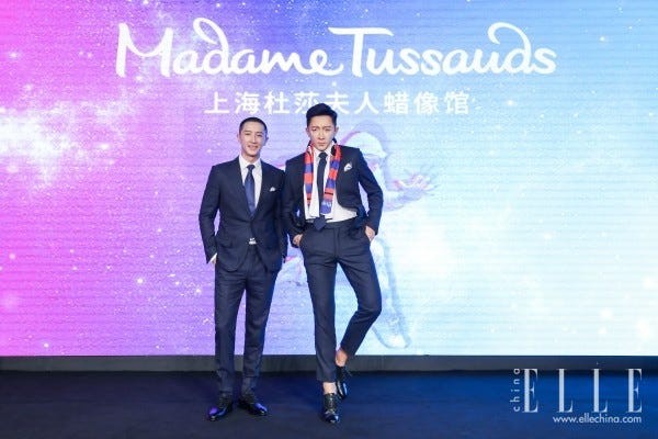 Fashion, Performance, Event, Suit, Talent show, Fashion design, Electric blue, Stage, Company, Formal wear, 