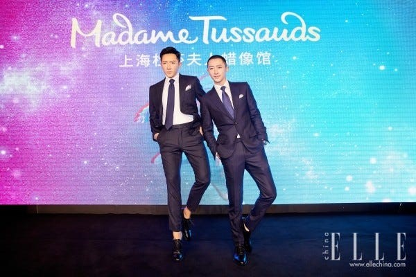 Sky, Fashion, Suit, Performance, Formal wear, Font, Album cover, Event, Tuxedo, Electric blue, 