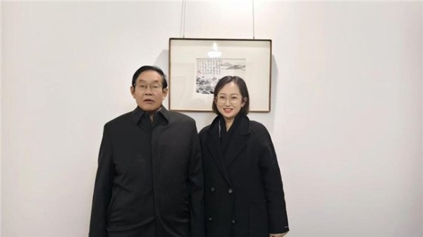(周洋与张文周合影)