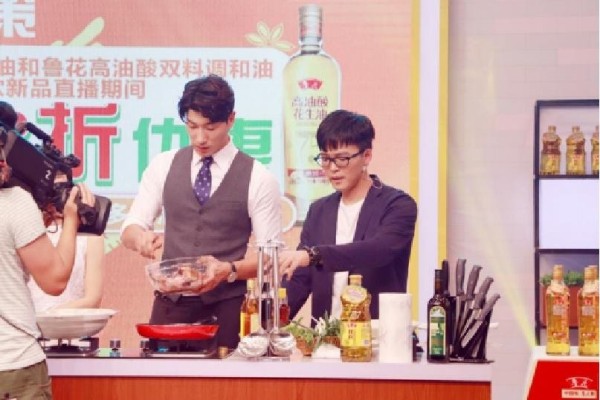 cooking demonstration with chefs and various cooking ingredients