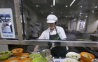 人民日报评论员：党政机关要带头过紧日子