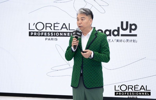 中国美发美容协会党支部书记、会长 唐德高