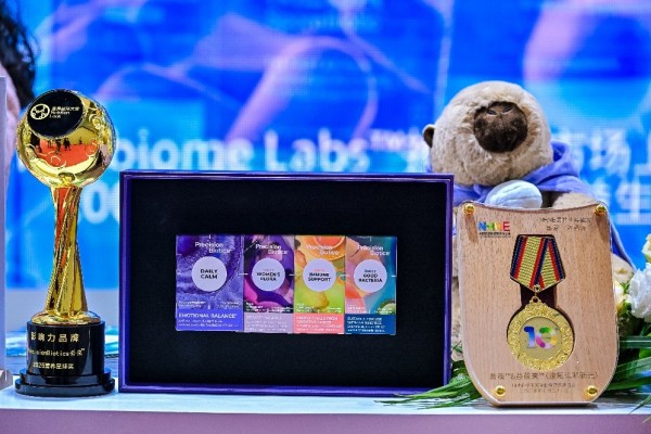 A group of medals and a teddy bear AI-generated content may be incorrect.
