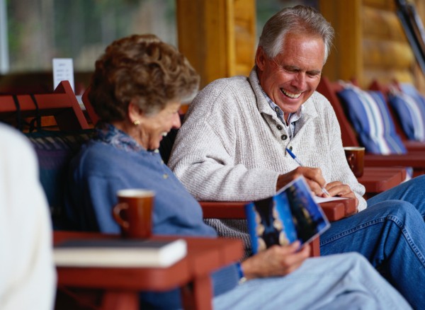Couple Writing Postcards