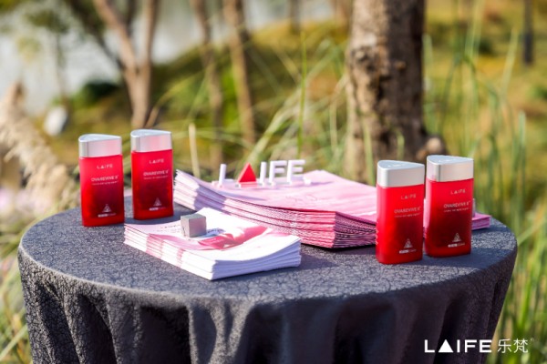 display of cosmetic products and promotional materials on a table