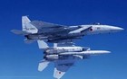 空中对决：日本F15逼近辽宁舰，尝到歼15的厉害了？