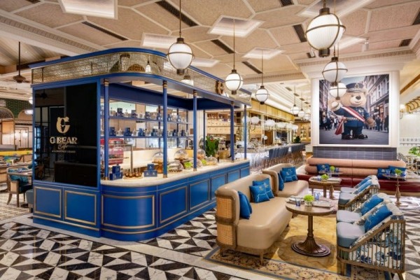 café interior with a blue counter comfortable seating and decorative elements