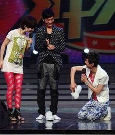 何炅身高之谜:165cm还是170cm?揭秘明星真实身高!