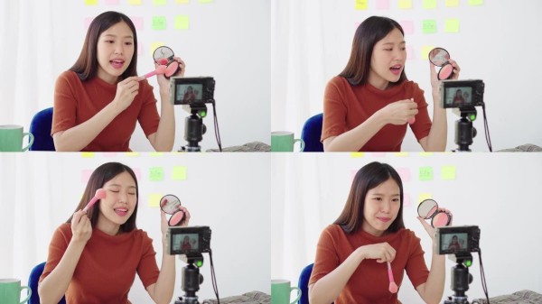 亚洲女性美容博主/vlogger通过互联网在线直播直播进行化妆化妆教程教学