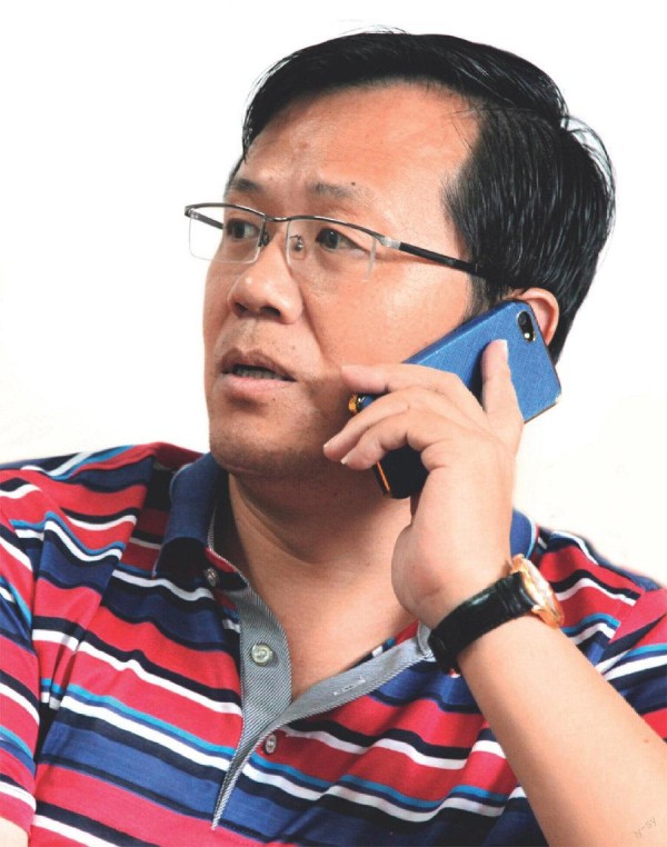 卓伟 以“狗仔”的名义