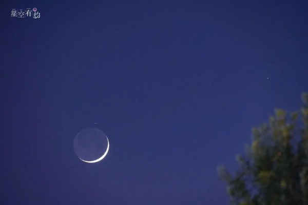 2023年6月20日在天津河西拍摄的金星伴月。（杨剑 摄）