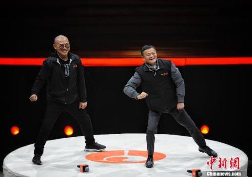 李连杰(左)心里一直有奥运梦