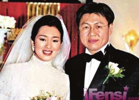 巩俐和黄和祥(图片来源:华西都市报)