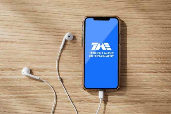 内容与平台“一体两翼”战略驱动飞轮效应,持续稳健增长的腾讯音乐