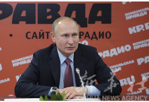 普京会见安倍晋三 称两国关系正日渐发展