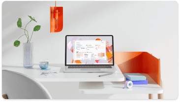 Laptop displaying a productivity application on a white desk with a vase, a notebook, and a pen, with an orange lamp and chair in the background