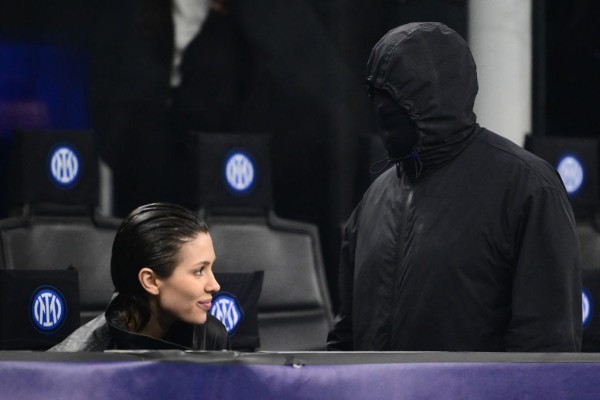 topshot us rapper kanye west r and girlfriend bianca censori are seen in the stands during the uefa champions league last 16 first leg football match inter milan vs atletico madrid at the san siro stadium in milan on february 20, 2024 photo by marco bertorello afp photo by marco bertorelloafp via getty images