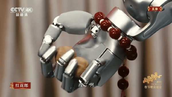 Galbot 单手盘核桃。来源：银河通用。