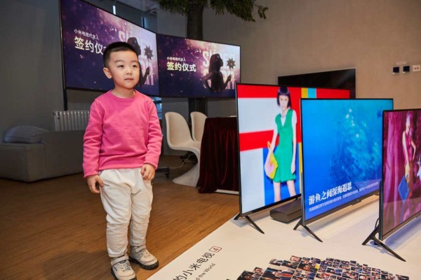 与米粉在一起 小米电视签约9名代言人