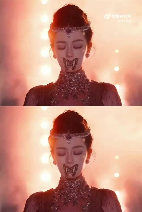 迪丽热巴八年前拍过亲吻蝴蝶,八年后蝴蝶意象贯穿雨夜红毯